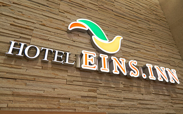 EINS.INN Umeda Higashi lobby logo